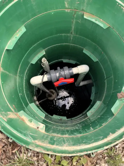 view of septic tank looking down an open riser